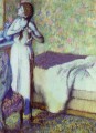 young girl braiding her hair 1894 Edgar Degas